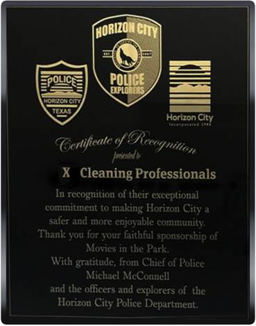 A plaque with the words hudson city police department on it.