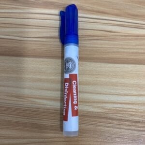 A blue and white Antibacterial Hand Sanitizer on a wooden table.